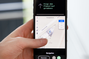  Eine eigens für die Immobilie entwickelte App ermöglicht z. B. die Navigation im Gebäude 