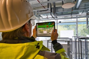  Modellabgleich mit der Realität: Mit Hilfe von Augmented Reality wird das digitale Modell direkt auf die reale Bausituation projiziert. So können Montagepositionen und Leitungsführungen präzise überprüft werden. 