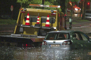  Eine überlastete Kanalisation, die zu unkontrollierbaren Überflutungen führt. Hier nach einem heftigen Unwetter am 29. Juli 2014 in Münster. 